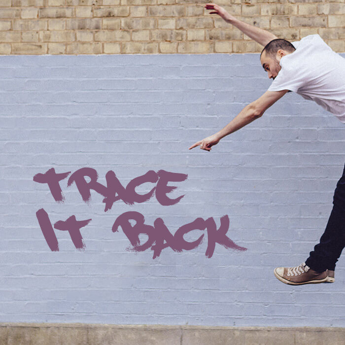 Jake leaps in front of a wall for the single artwork for Trace It Back